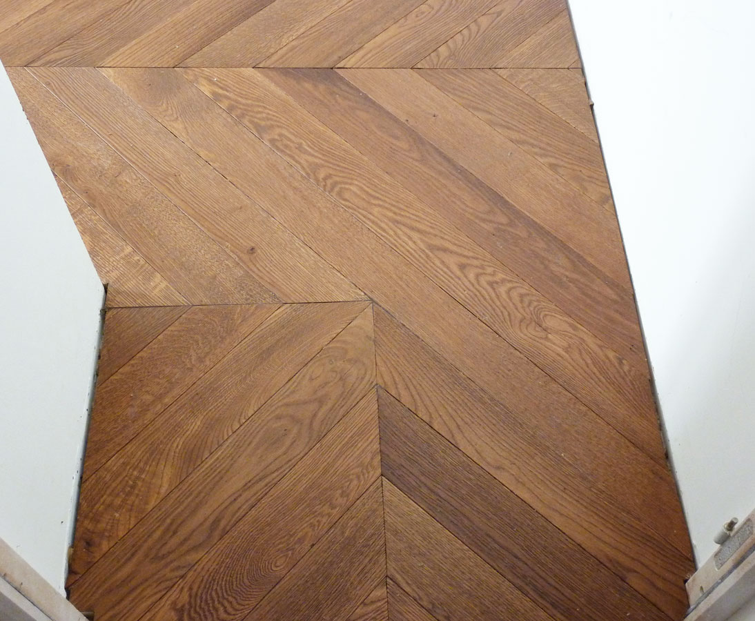 It looks like an old oak parquet flooring  