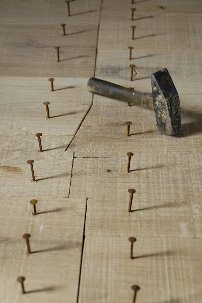 Placing forged nails