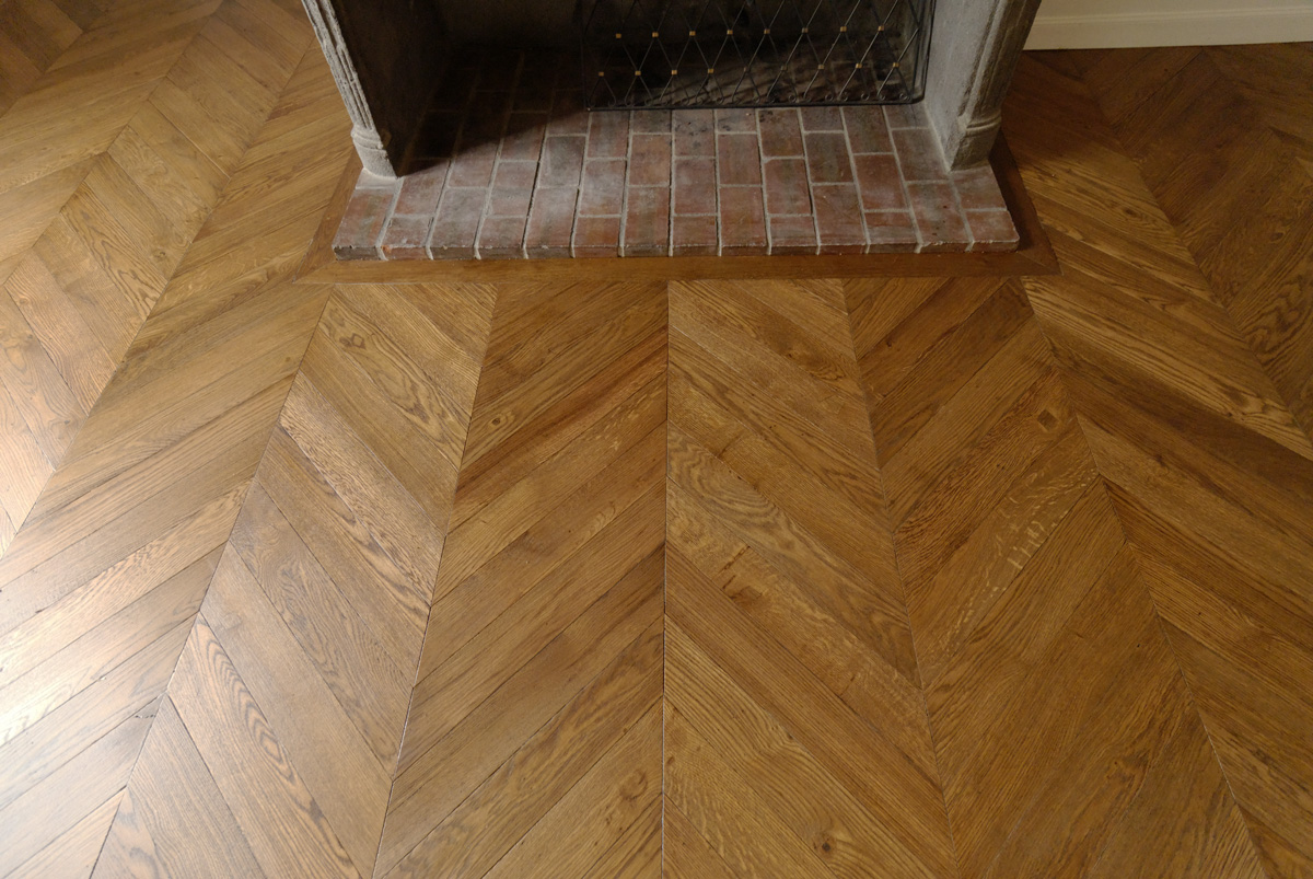 The fireplace is crucial for the establishment of the parquet floor